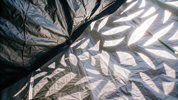 Intricate Shadow Patterns on Metallic Surface photo