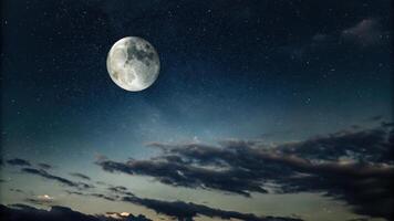 Scenic Night Sky with a Bright Moon and Clouds photo