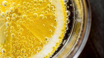 Close-Up of Bubbling Golden Honey in Glass Jar photo