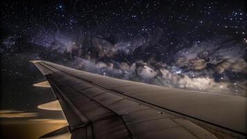 Airplane Wing View Over Cloudy Night Sky Scenery photo