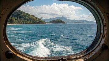 Ocean View Through Vintage Ship Porthole with Wake Trail photo