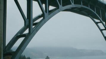 Close-Up of a Steel Bridge Structure in Foggy Weather photo