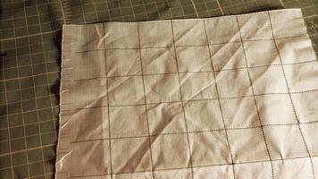 Homemade Dough with Grid Pattern on Baking Mat photo