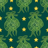 Seamless pattern with ketupat and stars on green background vector