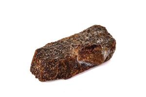 mineral stone Staurolite on a white background photo