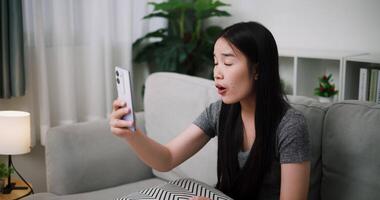 Handheld shot, A young woman quarrels with her boyfriend over a call, looking irritated and upset. Relationship problems video