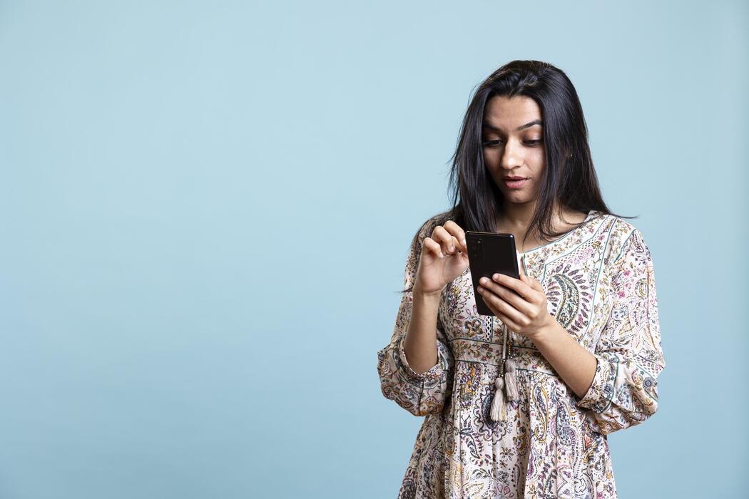 Keywords:
woman scrolling fashion feed on smartphone - Indian woman happily scrolling on phone to check social media feed ...