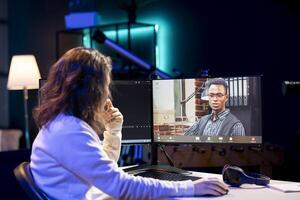 Computer science teacher doing online tutoring, telling student in online videocall about ways to fix computing bugs. IT professional teaching disciple in webinar how to do programming photo