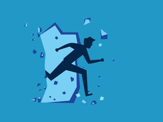 businessman is running through a broken wall
