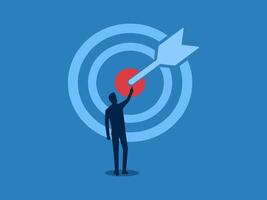 Focus, Businessman pointing at the center of a large target symbol vector