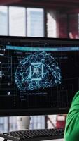 Vertical System engineer coding AI brain model of neural network for machine learning, solving tasks on computer. Debugging software algorithm and checking for errors, innovation. Camera A. video