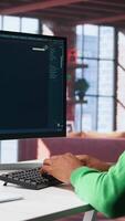 Vertical Digital editor uses AI powered text to generator to create content, listening to music on headset. Internet connectivity and artificial intelligence tools on high tech software. Camera B. video