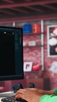 Vertical African american guy uses artificial intelligence chatbot trained to understand and generate information, data prompt for virtual generative technology. User talks with AI powered chat. Camera A. video