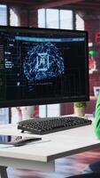 Vertical African american IT expert doing maintenance on artificial intelligence neural networks, writing code on terminal window. Male tech support engineer doing checkup on AI systems. Camera B. video