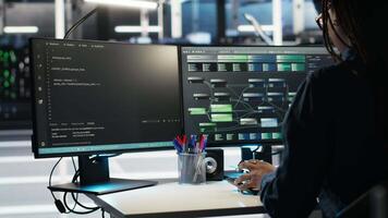 Data center programmer seeing critical error message while using node tree software to analyze datasets. Server room worker receiving glitch popup warning while using visual programming tool, camera B video
