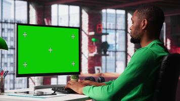 Freelancer completing spreadsheets on isolated chroma key on pc, entering data and calculating totals. Remotely working accountant analyzing figures, using spreadsheet software. Camera A. video