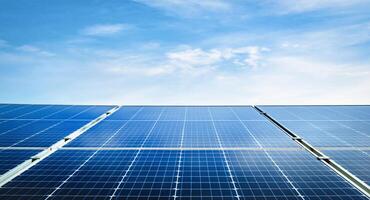 solar panel array is shown in the sky with a blue sky background photo