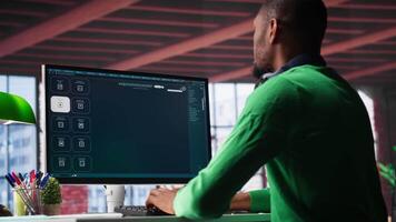 Videographer editor creates AI art materials using text to software, writing a text prompt on chatbot interface to generate a with artificial intelligence. Visual design. Camera A. video