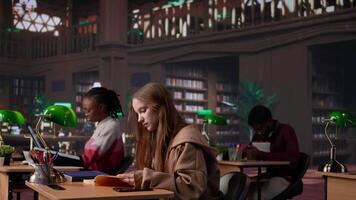 Noisy girl disturbing students at the library by speaking very loud on call, being rude and answering her phone in the study area. Disruptive annoying person asked to keep silence. Camera B. video