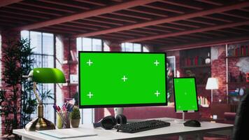 Isolated screen with chroma key in glamorous urban home office. Bright open workspace combines refined luxury with organized comfort, offering a tasteful backdrop for professional work. video