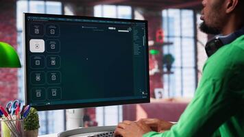 African American person uses AI chatbot to generate a montage at home office, deep learning models and cloud technology for a personalized project, text to . Camera A. video