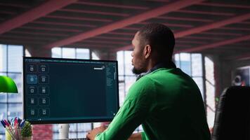 Digital editor uses AI powered text to generator to create content, listening to music on headset. Internet connectivity and artificial intelligence tools on high tech software. Camera A. video