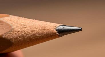 Sharpened Pencil Point Close-up for Drawing Writing or Sketching Purposes photo