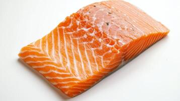 Fresh salmon fillet on a clean white surface ready for cooking or preparation in a modern kitchen photo