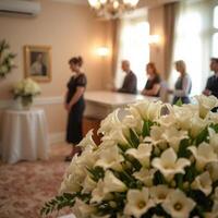 A wedding ceremony with flowers in the background photo