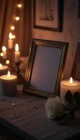 A photo frame with candles and a picture on it