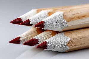 Wooden pencils with sharp tips aligned neatly for artistic projects and writing tasks photo