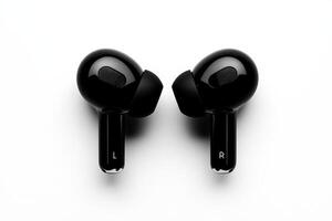 Wireless earphones in black color displayed on a white surface with clear visibility of design photo