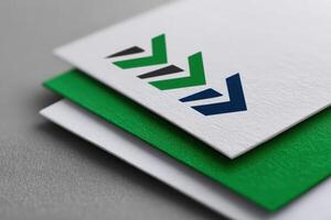 Comparison of three distinct logo versions showcasing design evolution and color variation photo