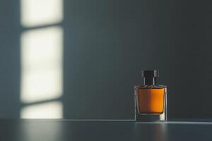 Elegant glass bottle with amber liquid illuminated by natural light in a minimalist setting photo