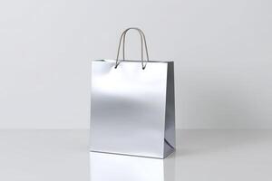 Stylish silver shopping bag on a clean surface ready for retail use photo