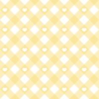 Gingham heart diagonal seamless pattern in pastel yellow color. Vichy plaid design for Easter holiday textile decorative. checkered pattern for fabric picnic blanket, tablecloth, dress, napkin. vector