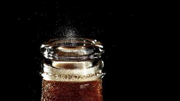 An open bottle of cola. Filmed on a high-speed camera at 1000 fps. High quality FullHD footage video