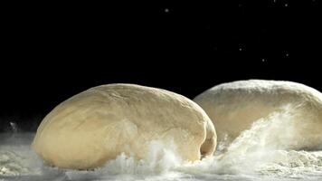 The dough falls on the table. Filmed on a high-speed camera at 1000 fps. High quality FullHD footage video