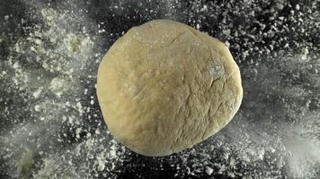 The dough flies up and falls down. Filmed on a high-speed camera at 1000 fps. High quality FullHD footage video