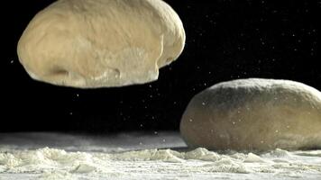 The dough falls on the table. Filmed on a high-speed camera at 1000 fps. High quality FullHD footage video