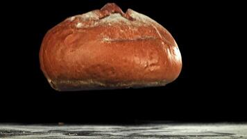 The bread falls on the table. Filmed on a high-speed camera at 1000 fps. High quality FullHD footage video