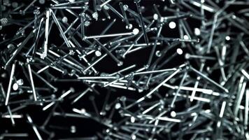 The nails fly up and fall down. Filmed on a high-speed camera at 1000 fps. High quality FullHD footage video
