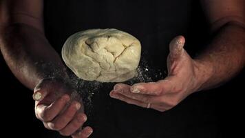 The dough is in the hands of the chef. Filmed on a high-speed camera at 1000 fps. High quality FullHD footage video