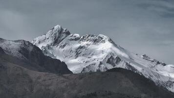 Landscape with snow mountains in the background photo
