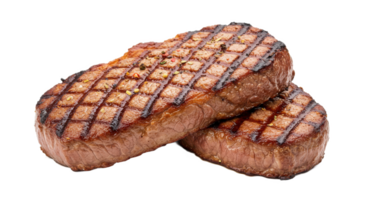 Two grilled steaks stacked on top of each other with visible grill marks png