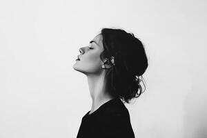 Black and White Portrait of a Woman with Closed Eyes photo
