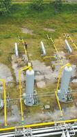 Gas production. Large gas distribution complex. A gas worker or a station operator shuts off the gas supply. Gas production station located in the mountains. video