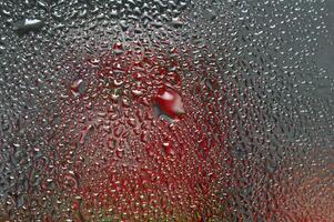 Dewdrops on the refrigerator glass texture photo