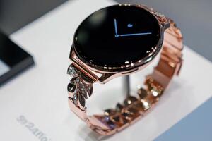 Trendy Smartwatch with a Black Screen and Glamorous Bracelet Accent photo