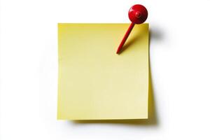 yellow sticky post it note with red pushpin isolated on white background photo